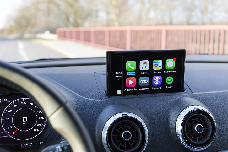 Audi Car Dashboard with Apple CarPlay Interface Display