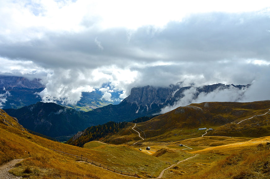 Dramatic Mountain Landscape with Clouds and Golden Hills