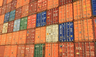 Stacked Shipping Containers in Port Yard