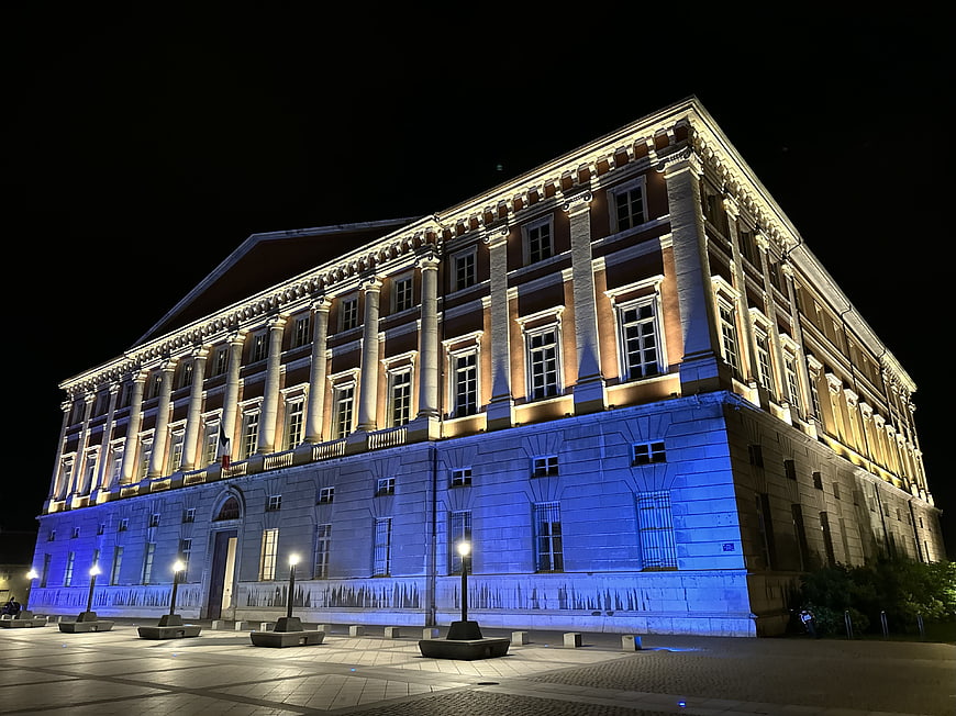 Illuminated Historic European Town Hall at Night