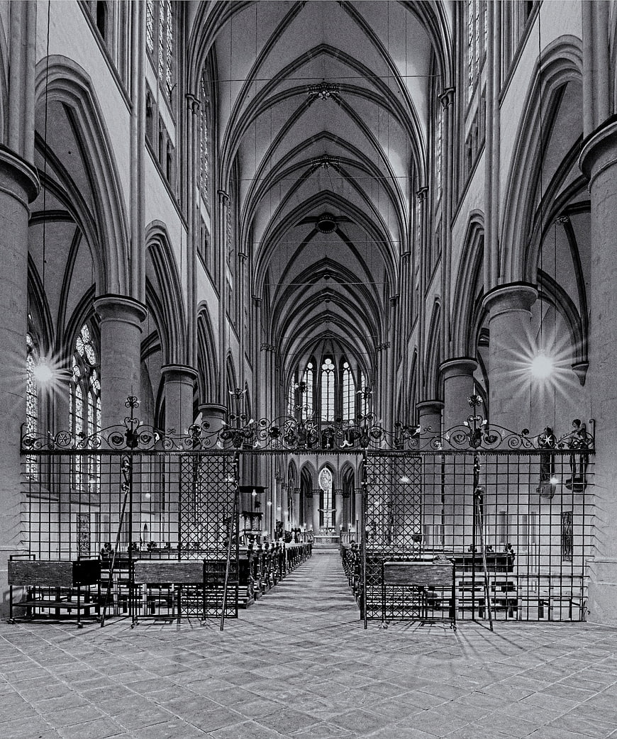 Black and white interior of Gothic cathedral with vaulted ceiling