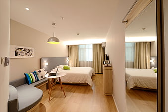 Modern Hotel Bedroom Interior with Sofa and Bed