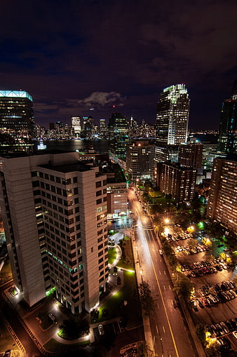 Aerial Night View of Downtown Cityscape with Light Trails