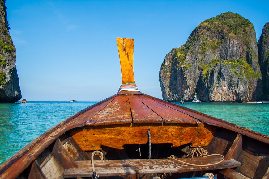 Traditional Thai Longtail Boat in Tropical Lagoon