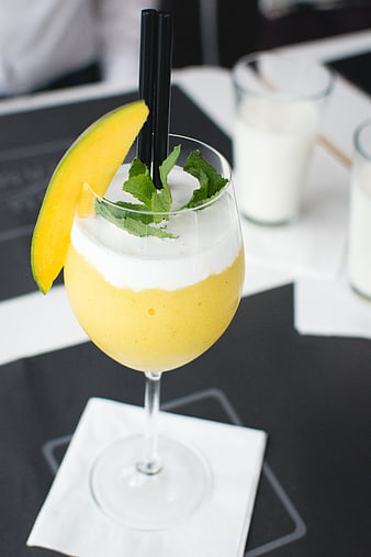 Frozen Mango Cocktail with Mint Garnish in Glass