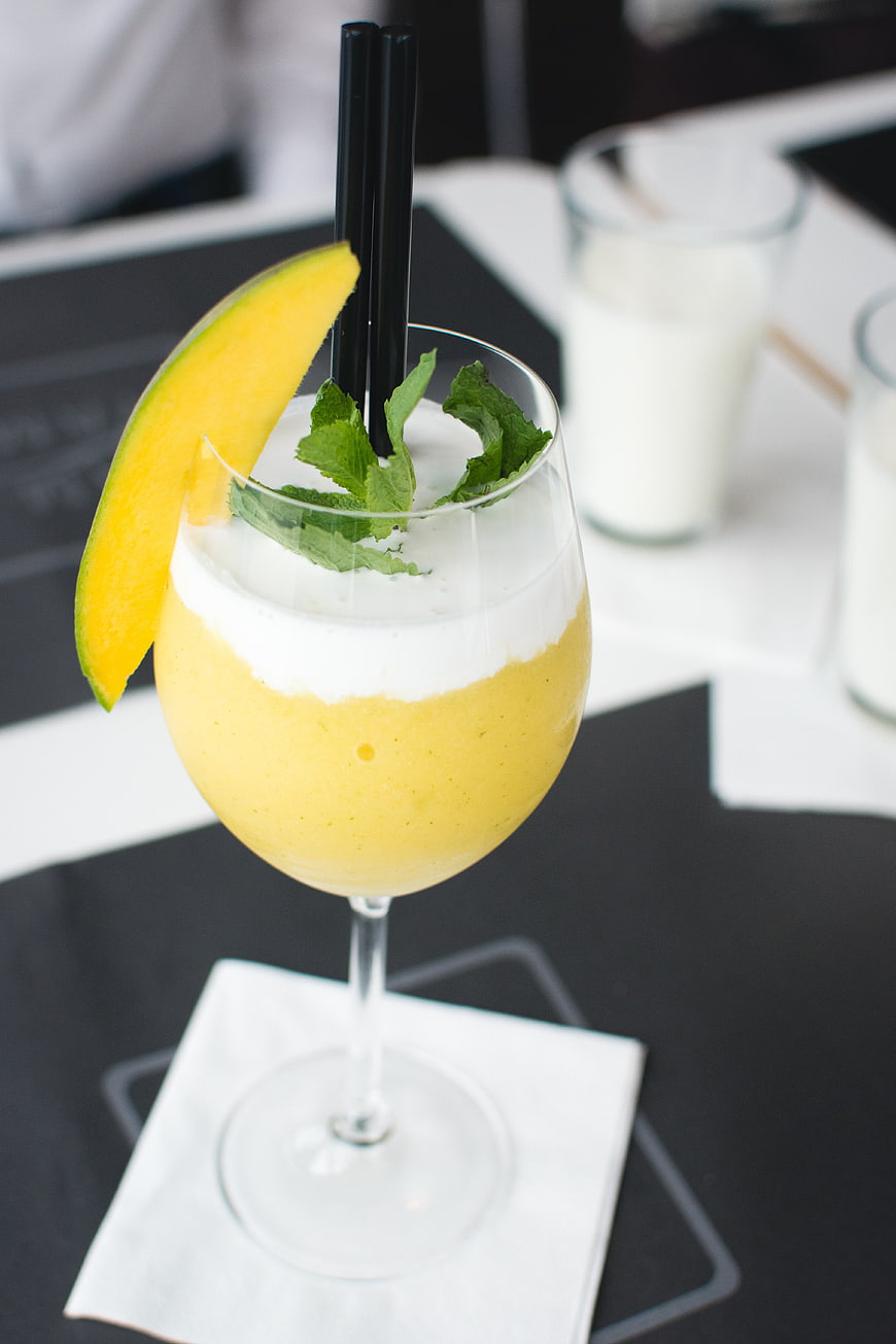 Frozen Mango Cocktail with Mint Garnish in Glass