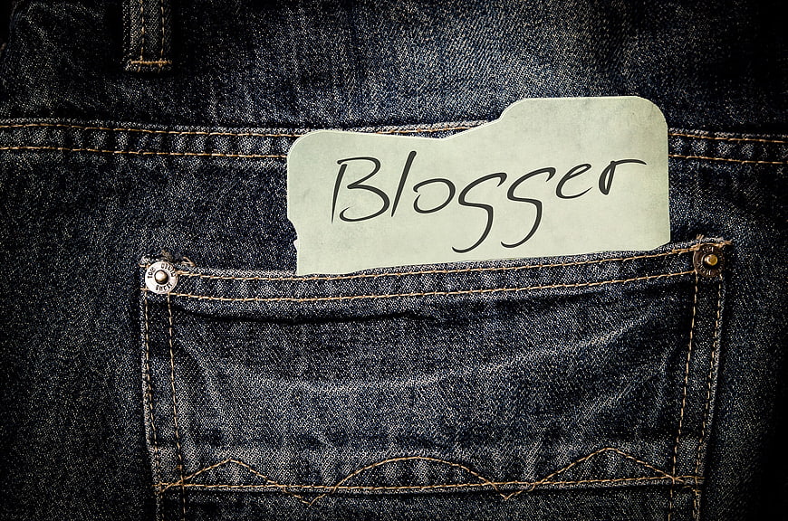 Blogger Note in Denim Jeans Pocket Close-Up