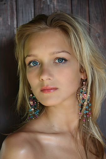 Blonde Woman Portrait With Colorful Beaded Earrings