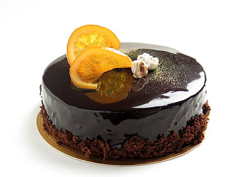 Glossy Chocolate Cake with Dried Orange Slices and Hazelnuts