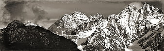 Dramatic Black and White Snowy Mountain Peaks Panorama