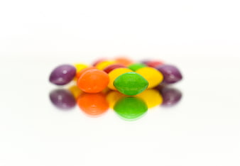 Colorful Skittles Candy on White Background