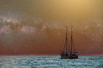 Sailboat on Ocean Under Starry Night Sky