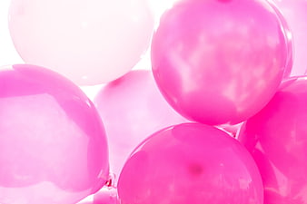 Close-up of shiny pink balloons for party background