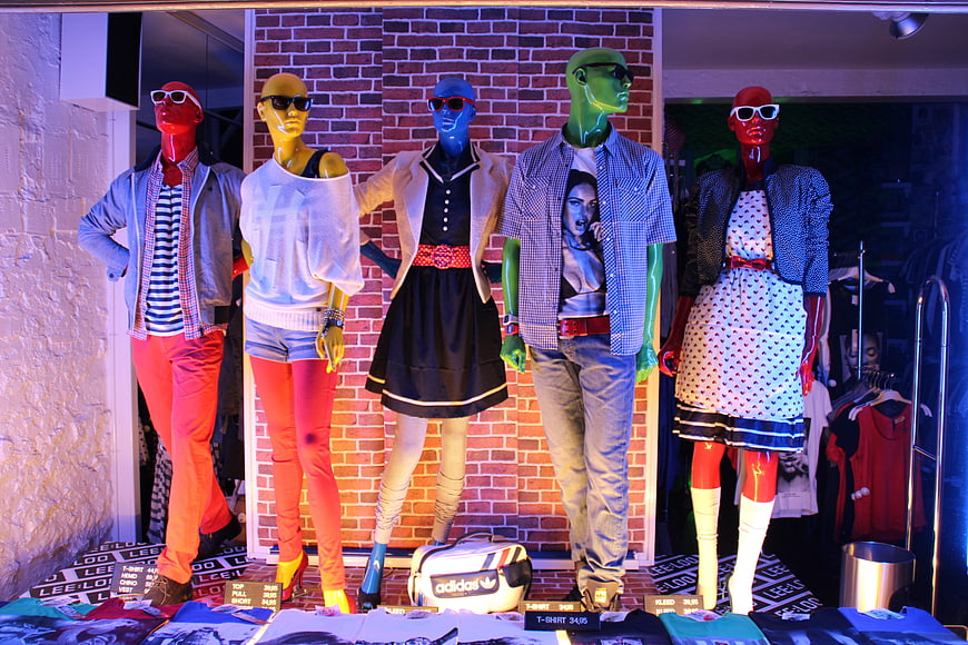 Colorful Mannequins In Fashion Store Window Display