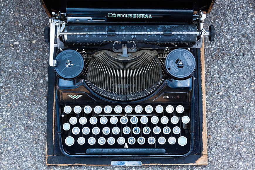 Vintage Continental Portable Typewriter On Gravel Surface