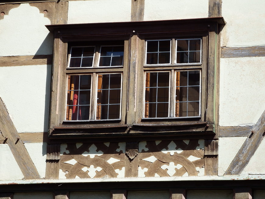 Detail of a historic half-timbered house window in Bavaria