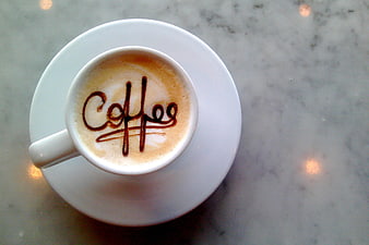 Top View Cappuccino with Coffee Latte Art on Marble