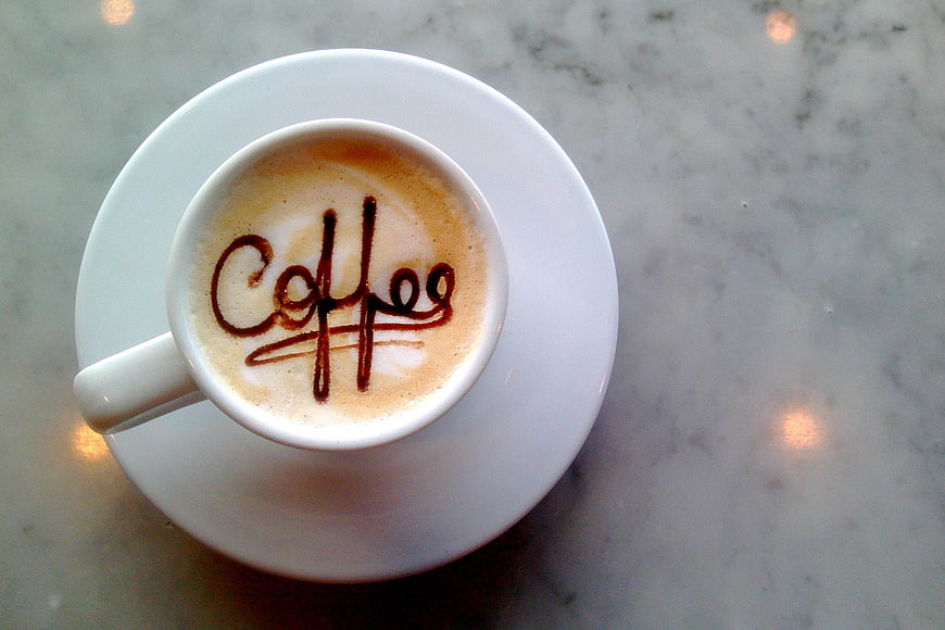 Top View Cappuccino with Coffee Latte Art on Marble