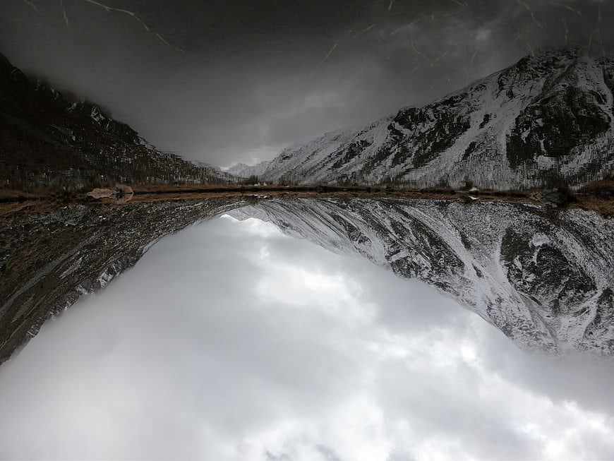 Snowy Mountain Valley Reflection in Lake