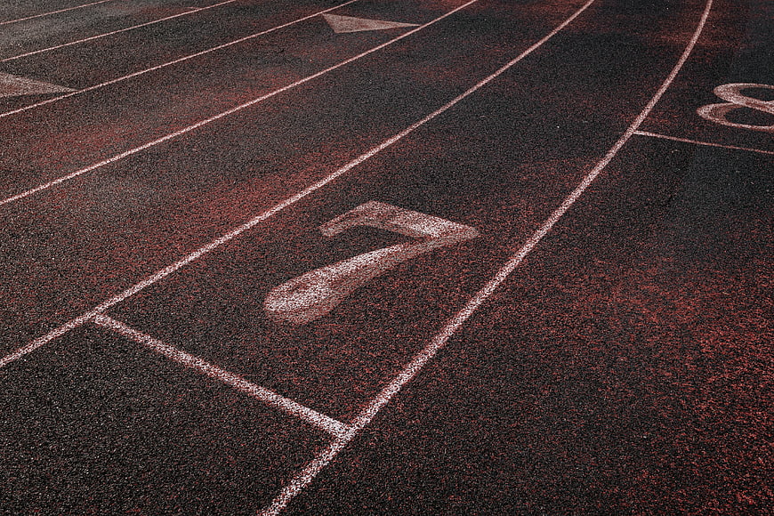 Close-up of Lane Number 7 on Red Running Track