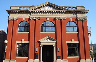 Red Brick Classical Building with Arched Windows