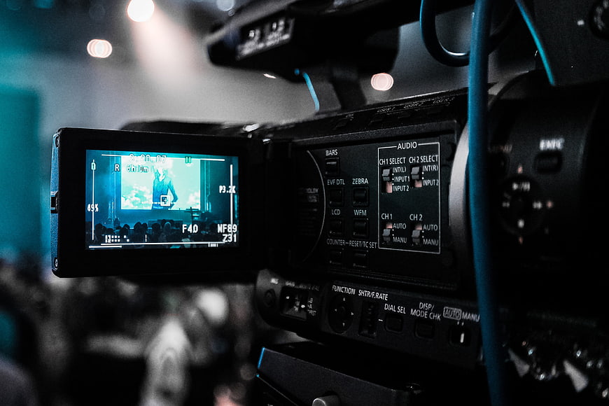 Close-up of professional video camera recording live concert
