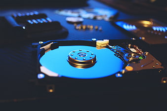 Open Hard Drive Platter with Blue Lighting