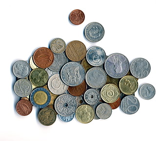 Collection of old European coins on white background