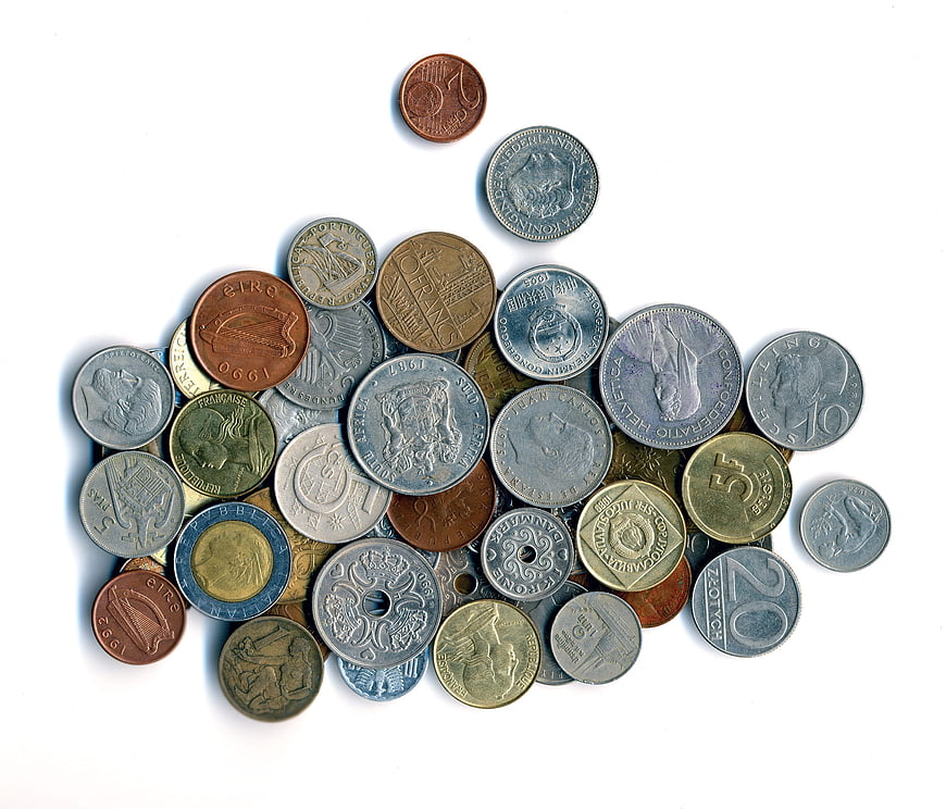 Collection of old European coins on white background