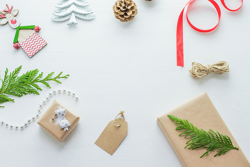 Christmas Gift Wrapping Flat Lay with Ornaments and Copyspace
