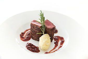 Gourmet Beef Filet Mignon with Rosemary and Berry Sauce