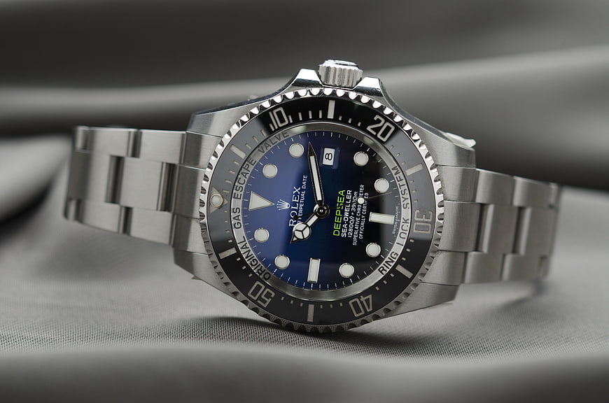 Close-up of a luxury Rolex Deepsea watch with blue dial