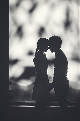 Romantic Black and White Silhouette of Couple Foreheads Touching
