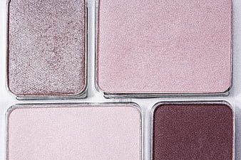 Close-up of pink and mauve eyeshadow palette with shimmer and matte finishes