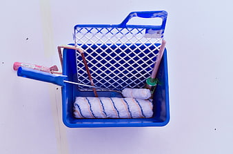 Blue Paint Tray with Rollers and Tools on White Background