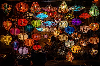 Colorful Vietnamese Lanterns Hanging in Night Market Shop