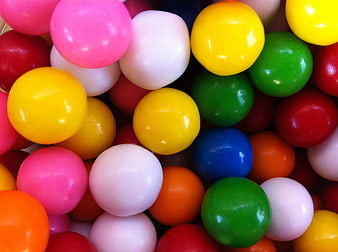 Close-up of colorful round candies in vibrant hues