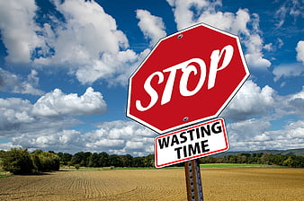 Stop Wasting Time Sign In Rural Field