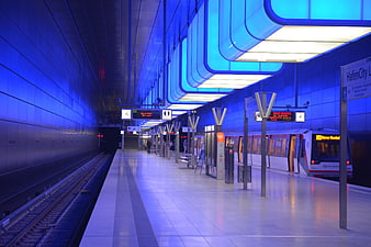 Modern Blue Underground Subway Station with Train