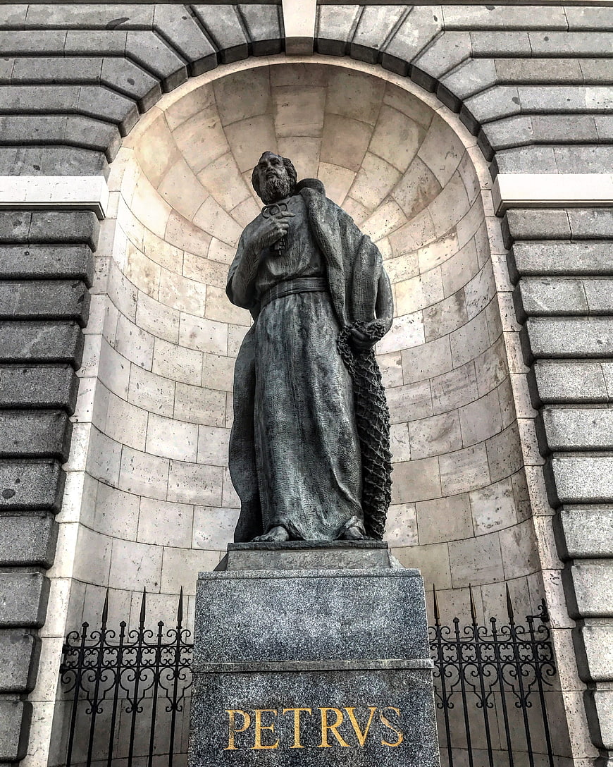 Bronze Statue of Saint Peter in Stone Archway