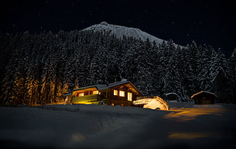 Cozy Alpine Chalet Under Starry Night Sky With Snowy Mountain