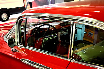 Close-up of Classic Red Vintage Car Interior and Chrome Details