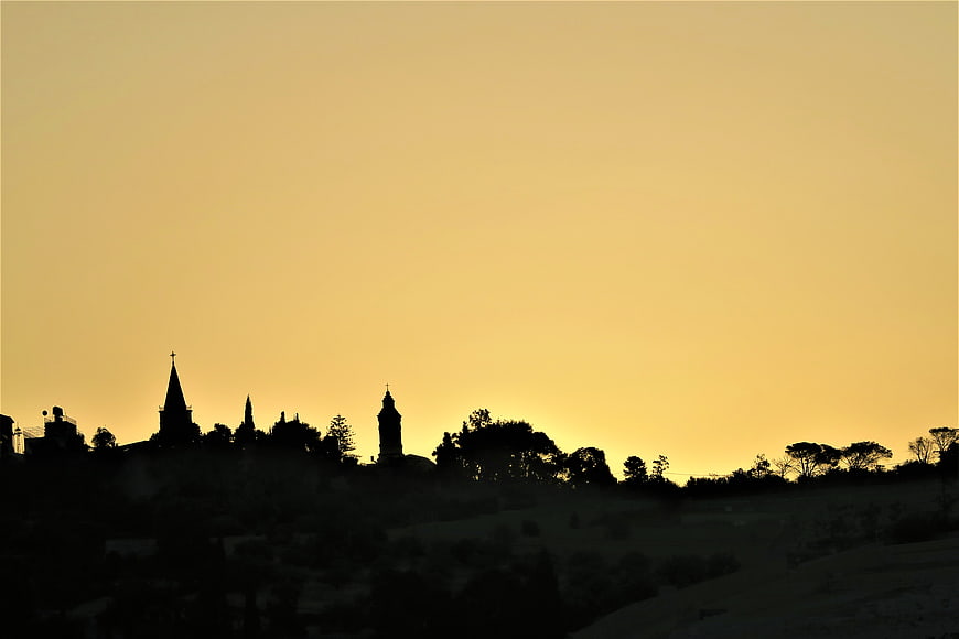 Silhouette of Jerusalem skyline at sunrise from Mount of Olives