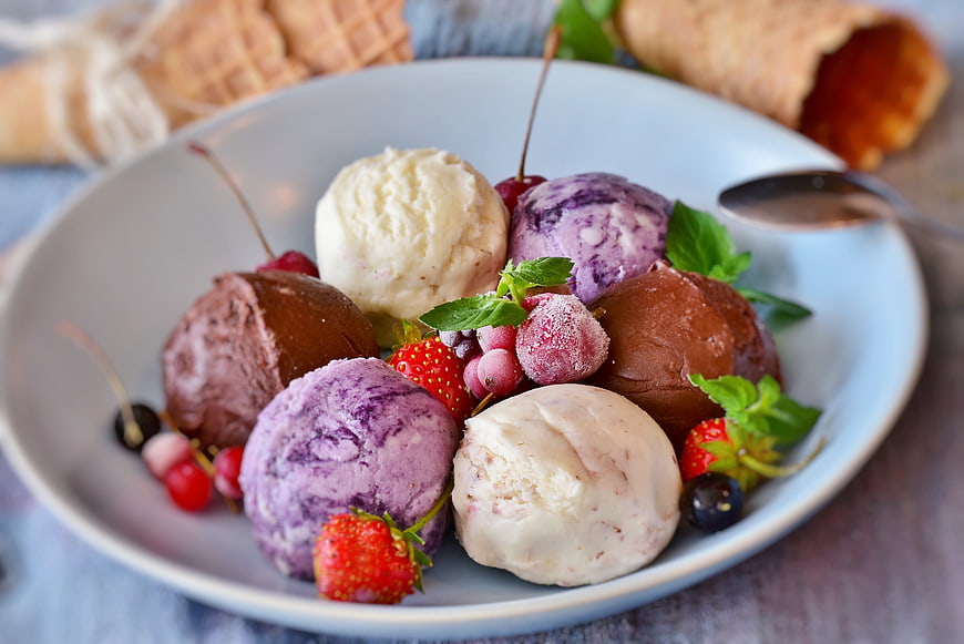 Colorful Ice Cream Sundae Bowl With Fresh Berries And Waffle Cones