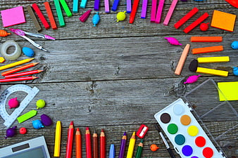 Colorful School Supplies Flat Lay on Rustic Wooden Background