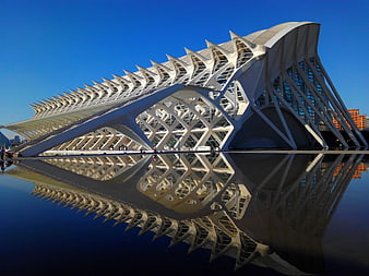 Modern White Architectural Structure with Water Reflection