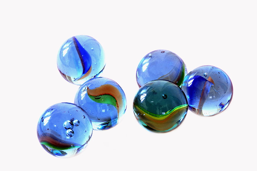 Colorful Glass Marbles on White Background