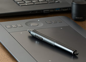 Wacom Graphics Tablet and Pen on Desk