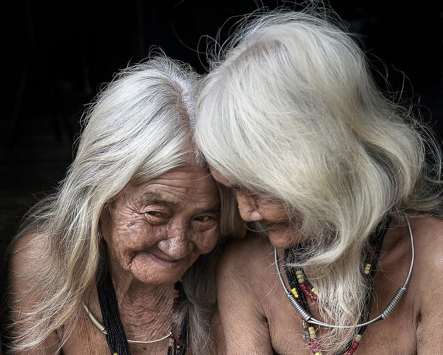 Portrait of two elderly indigenous women with white hair