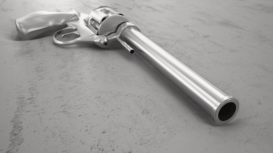 Silver 3D Rendered Revolver Gun On Gray Concrete Surface